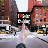 I_Love_Solar_Cooking_WhiteSquareSticker_Hand_Mockup.png_16183602