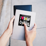 I_Love_Solar_Cooking_WhiteSquareSticker_Notebook_Mockup.png_16183604
